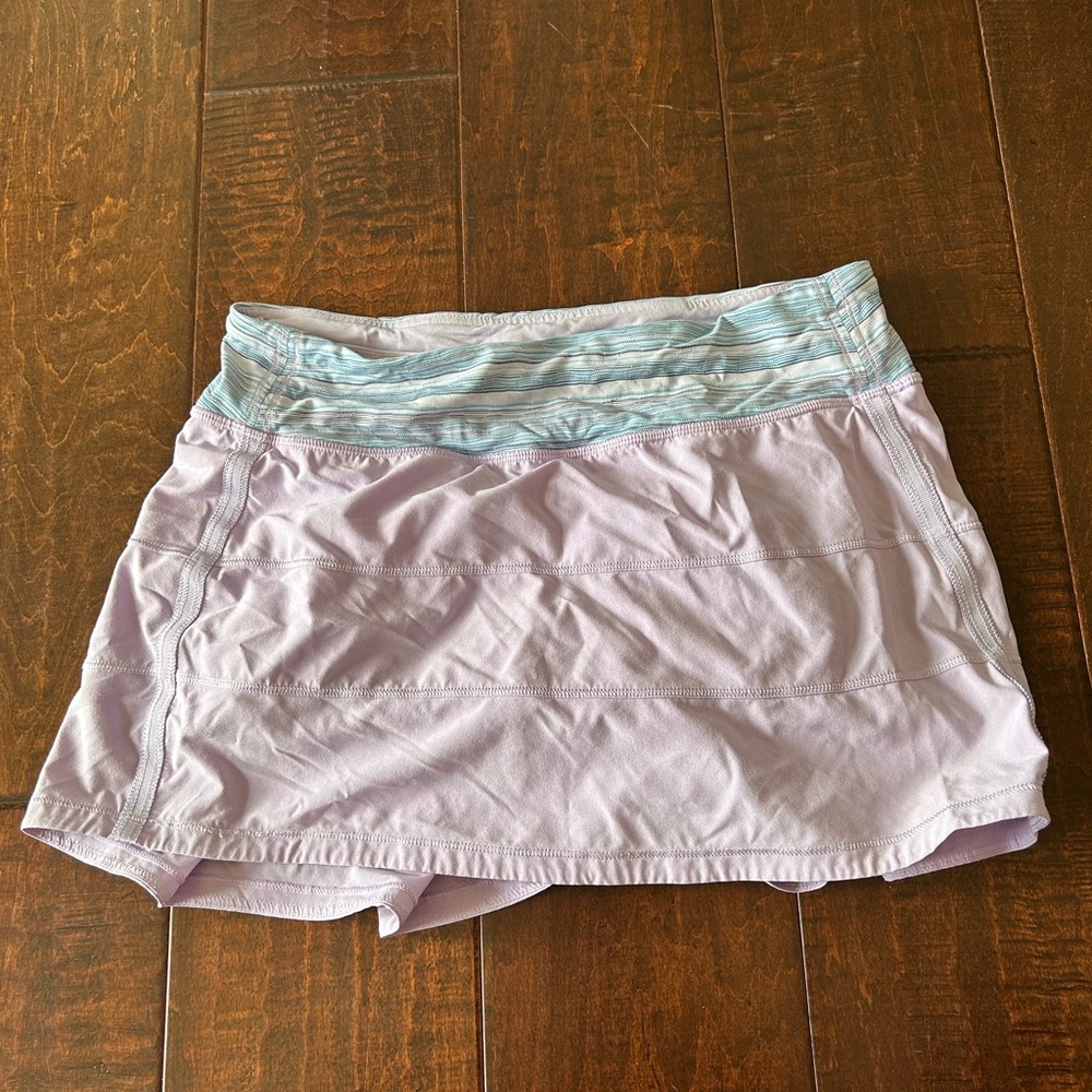 Lululemon light purple tennis skirt built in short with blue waist band